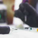 Photo by Kelly Sullivan/ Peninsula Clarion Lori Salyers has more than 20 tattoos, she said, Saturday, March 14, 2015, at Ink Works in Kenai, Alaska. It is hard to chose her favorite, but the ones commemorating her daughters triumphant battler with cancer are likely her top picks.