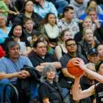 Photo by Rashah McChesney/Peninsula Clarion  Nikolaevsk's Jonah Fefelov looks for an opening to pass during a game against Noorvik for the 2015 March Madness Small Schools basketball tournament on Saturday March 14, 2015 in Anchorage, Alaska. Nikolaevsky won 50-33.
