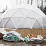 Photo by Kelly Sullivan/ Peninsula Clarion Lark Ticen's 20-foot Arctic Dome was built by James Freed, who installs 15, 20 or 60-foot structures approved through the Natural Resources Conservation Service Seasonal High Tunnel Initiative System for Crops, Monday, March 16, 2015, in Kenai Alaska.