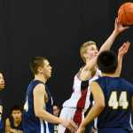 Photo by Rashah McChesney/Peninsula Clarion Nikolaevsk's Neil Gordeevshoots during a game against Angoon for the March Madness Small School basketball tournament on Monday Mach 16, 2015 in Anchorage, Alaska.