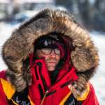 Mitch Seavey mushes into White Mountain during the Iditarod Trail Sled Dog Race on Tuesday, March 17, 2015.   Dallas Seavey has won his third Iditarod in the last four years, beating his father, Mitch,  to the finish line in Nome early Wednesday after racing 1,000 miles across Alaska. (AP Photo/Alaska Dispatch News, Loren Holmes )