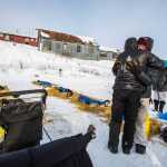 Dallas Seavey, left, gets a hug from his father Mitch Seavey at the White Mountain, Alaska checkpoint shortly before Dallas departed during the Iditarod Trail Sled Dog Race on Tuesday, March 17, 2015. Dallas left the checkpoint with a comfortable four-hour lead.  Seavey has won his third Iditarod in the last four years, beating his father, Mitch to the finish line in Nome early Wednesday after racing 1,000 miles across Alaska. (AP Photo/Alaska Dispatch News, Loren Holmes )        .