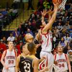 Photo by Rashah McChesney/Peninsula Clarion Seldovia's Dylan Waterbury goes for a layup during their game against the Scammon Bay on March 18, 2015. Seldovia won their game and the small schools championship 62-34.