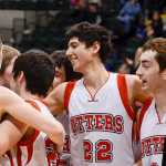 Photo by Joey Klecka/Peninsula Clarion  Seldovia players celebrate after winning their small school championship game against Scammon Bay on March 18, 2015 in Anchorage, Alaska. Seldovia won 62-34.