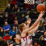 Photo by Joey Kleck/Peninsula Clarion Seldovia's Aidan Philpot shoots during their championship game against Scammon Bay on Wednesday March 18, 2015 in Anchorage, Alaska. Seldovia won their game and the state's small schools championships 62-34.