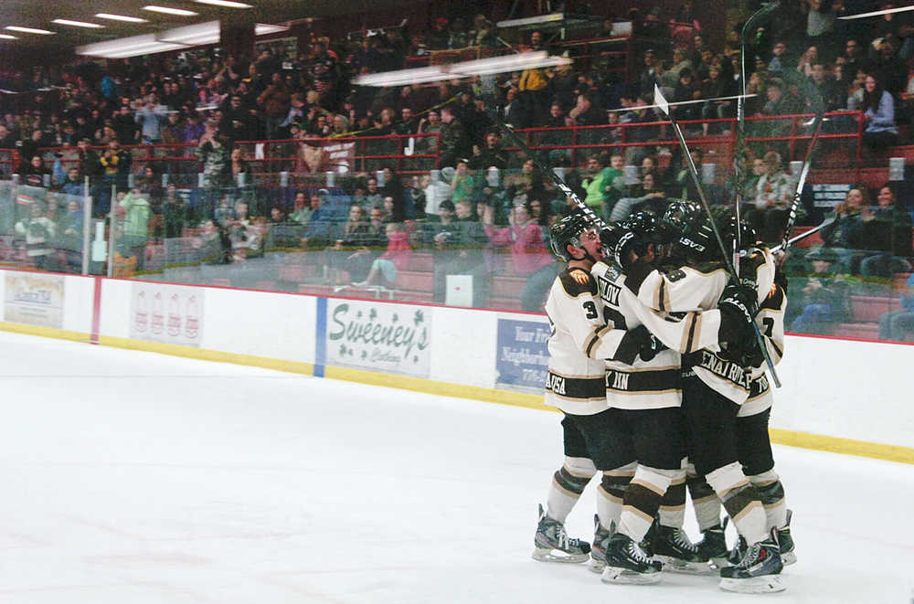 Photo by Rashah McChesney/Peninsula Clarion Kenai River Brown Bears celeberate their second goal during a game against the Fairbanks Ice Dogs on Friday March 20, 2015 in Soldotna, Alaska.