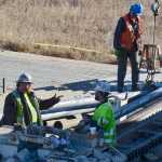 Photo by Rashah McChesney/Peninsula Clarion  Workers with Arizona-based Southeast Directional Drilling work to run a drill tunneling into the ground along Bridge Access Road on Tuesday March 24 2015 in Kenai, Alaska. The line will run underneath the Kenai River and connect an Enstar Natural Gas Company transmission line with the nearby Cook Inlet Natural Gas Storage Alaska facility.