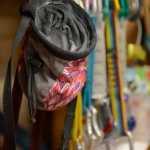 Photo by Rashah McChesney/Peninsula Clarion A rack of gear hangs at Redoubt Rock Climbing in Nic and Natalie Larson's home on Wednesday April 1, 2015 in Soldotna, Alaska. The Larsons offer climbing lessons and open gym periods in their Soldotna home.