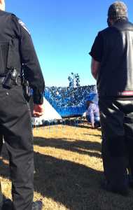 By Ian Foley/Peninsula Clarion A young girl plants a pinwheel in front of several child advocacy groups on Friday, April 3 in front of the Soldotna Police Station.