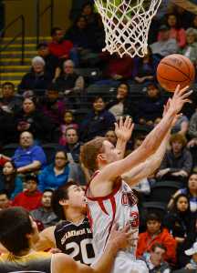 Photo by Joey Kleck/Peninsula Clarion Seldovia's Aidan Philpot shoots during their championship game against Scammon Bay on Wednesday March 18, 2015 in Anchorage, Alaska. Seldovia won their game and the state's small schools championships 62-34.