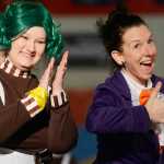 Photo by Kelly Sullivan/ Peninsula Clarion Rachel Shassetz, skating as an Oompa Loompa pauses to smile next to Laleta Vidal who played Willy Wonka Sunday, April 12, 2015, during the 20th Annual Riverskate Competition at the Soldotna Regional Sports Complex in Soldotna, Alaska.