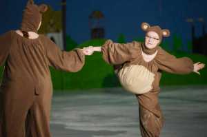 Photo by Kelly Sullivan/ Peninsula Clarion Amanda Ritchie and Rachel Shassetz perform as characters from the Disney movie "Brother Bear" in a "Couples Spotlight" performance of the program Sunday, April 12, 2015, during the 20th Annual Riverskate Competition at the Soldotna Regional Sports Complex in Soldotna, Alaska.