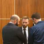 Photo by Rashah McChesney/Peninsula Clarion (left) Public Defenders Josh Cooley and Nathan Lockwood confer with Shane Heiman after jurors entered the courtroom and inadvertently saw him handcuffed during his trial on Monday April 13, 2015 in Kenai, Alaska. Ultimately, they moved for a mistrial which the judge will take up on Tuesday.