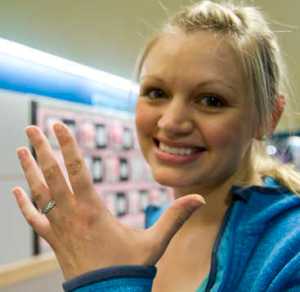 Nikki Balovich shows her platinum wedding ring that had gone missing in January, after it was returned to her Thursday, April 16, 2015, in Sitka, Alaska. The ring was returned after it was discovered in dog waste.   (James Poulson(/The Daily Sitka Sentinel via AP) MANDATORY CREDIT