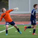 Photo by Rashah McChesney/Peninsula Clarion  Eagle River goalie Chris Jensen throws the ball down the field during their game against Soldotna High School on Friday April 24, 2015 in Soldotna, Alaska.