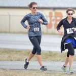 Photo by Rashah McChesney/Peninsula Clarion (left) Connie Best, of Soldotna and Kenda Blanning, of Kenai, finish the Care 2 Run race on Thursday May 7, 2015 at the Grace Brethren Church in Soldotna, Alaska.