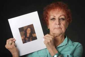 ADVANCE FOR SUNDAY MAY 10, 2015 AND THEREAFTER- In this photo taken April 26, 2015, Judy Connolly holds a photograph in Anchorage, Alaska, that was taken just days before her 16-year-old daughter Shelley Connolly was found dead in 1978. On a foggy Saturday morning in early January 1978, the body of a 16-year-old girl was found in a ditch off the Seward Highway. An autopsy would later determine she had been beaten, sexually assaulted, dragged behind a car and then tossed down an embankment. (Bill Roth/Alaska Dispatch News via AP)