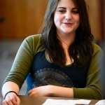 Photo by Rashah McChesney/Peninsula Clarion  Shannon Bradford laughs during a break in a Dungeons & Dragons game on April 22, 2015 in the community room at the Soldotna Library. Bradford and a handful of others play the fantasy role playing game regularly at the library and will be hosting a marathon D&D day at the library for community members interested in learning more about gameplay.