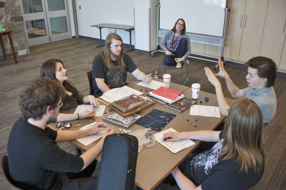 Photo by Rashah McChesney/Peninsula Clarion A small group meets regularly to play the fantasy role-play gaming Dungeons & Dragons at the Soldotna Public Library. The group will host their first open-to-the-public D&D Marathon on Saturday for members of the community who are interested in playing or learning more about the game.