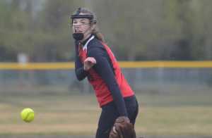 Photo by Kelly Sullivan/ Peninsula Clarion Kenai Central High School pitcher Cierra King throws a pitch Thursday, May 14, 2015, at the Steve Shearer Fields in Kenai, Alaska.
