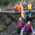 Kids collecting trash help Kenai River Spring Cleanup