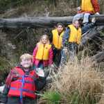 Kids collecting trash help Kenai River Spring Cleanup