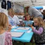 Photo courtesy Karl Kircher Teachers and students helped out at Industry appreciation day Saturday, August 23, 2014, at the Kenai Green Strip in Kenai, Alaska.