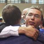 Photo by Kelly Sullivan/ Peninsula Clarion Graduating senior Jacob Williams spends time with friends and family following commencement Wednesday, May 21, 2015, in the Nikiski Middle-High School commons area in Nikiski, Alaska.