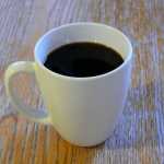 Photo courtesy Matt Bowser/USFWS. A cup of fresh-brewed chaga tea.