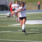 Kenai's Heidi Perkins moves the ball down the filed during a 2-1 overtime win over the Warriors in the Northern Lights Conference semifinals May 22 at Palmer High School. Perkins scored both Kenai goals in the game.