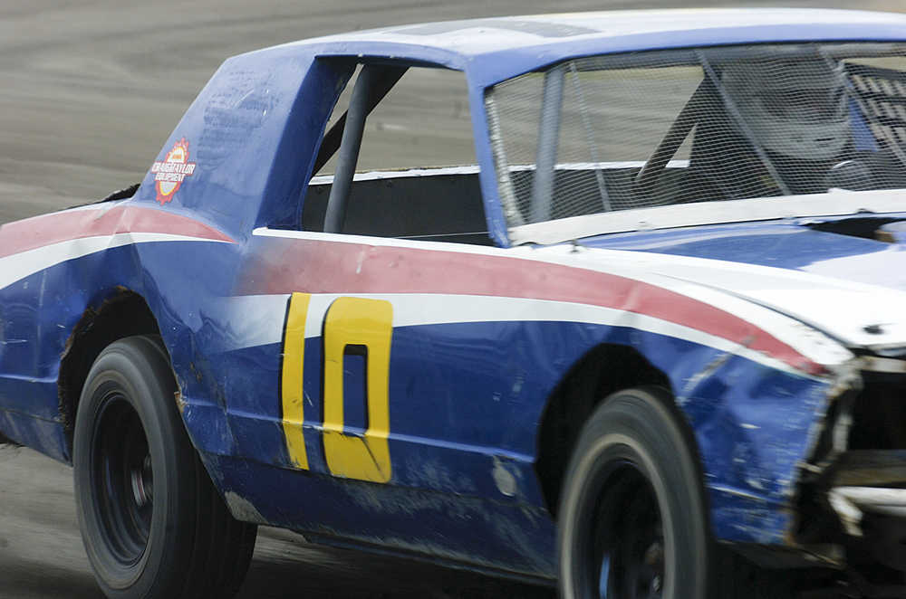 Photo by Rashah McChesney/Peninsula Clarion  Mike Eyre, of Kenai, takes his car for a spin at the Twin City Raceway during a pre-season Test & Tune day for drivers and teams who want to work the racing kinks out pre-season on Saturday May 23, 2015 in Kenai, Alaska.