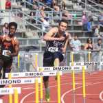 Soldotna senior Tim Duke (center) clears a hurdle en route to winning the 4A boys 300-meter hurdle race, Saturday at the Alaska state high school track and field championships in Anchorage.