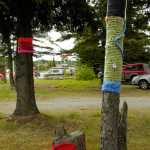 Photo by Megan Pacer/Peninsula Clarion Handcrafted decorations clothe the trees and attract passersby to three newly opened shops on Wednesday in Soldotna.
