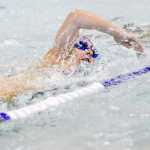 Photo by Rashah McChesney/Peninsula Clarion Katy Meek swims during the first leg of her Tri the Kenai triathlon competition day on Sunday June 14, 2015 in Soldotna, Alaska.