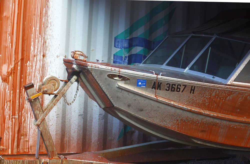 A tanker plane drops a load of retardant on the Card Street fire in Sterling on Monday. (Photo by Kelly Sullivan/Peninsula Clarion)