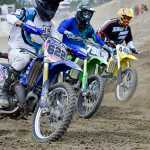 Photo by Rashah McChesney/Peninsula Clarion  Racers take off during a state motocross meet on Saturday June 20, 2015 at the Twin City Raceway in Kenai, Alaska.