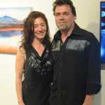 Asia Freeman, left, and Michael Walsh, right, pose at the June 4 opening of their show, "Watermark," at the Pratt Museum.