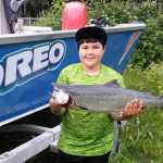 Chris Hawkins shared this photo of Nathan Hawkins and his first Kenai  king salmon, caught on July 1. The fish weighed in at 10 pounds.