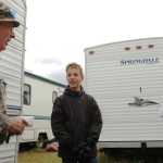 Ben Boettger/Peninsula Clarion Roland Cherrier sits on the dock of the Copper River Seafoods processing facility, near the lot where he operates the newly-opened RJC RV park, as well as fish-cleaning tables and a flaked ice business, on Friday July 17.