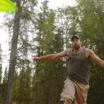 Ben Boettger/Peninsula Clarion Kyle McCowan hurls a frisbee during a disc golf tournament at Tsalteshi Trails on Saturday, July 25.
