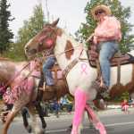 Ben Boettger/Peninsula Clarion Molly (center) and Kaegan (right) Koski sell their homemade eight-bit style plastic figures in their tent at Centenial Park during Soldotna Progress Days on Saturday, July 25.