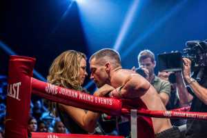This photo provided by The Weinstein Company shows, Rachel McAdams, left, as Maureen Hope and Jake Gyllenhaal as Billy Hope, in the film, "Southpaw."  The movie releases in the U.S. on July 24, 2015. (Scott Garfield/The Weinstein Company via AP)