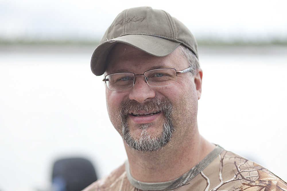 Matt Scheib, of Wasilla Scheib and a group of friends were dragging a cooler of sockeye salmon up the shoreline Wednesday after a guided personal use fishing trip. He said he wasn't sure if he'd fish again for red salmon during the 2015 season.  "I think I've got enough," he said. "My wife says I got enough."