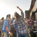 Photo by Megan Pacer/Peninsula Clarion Dozens of people dance among a cloud of bubbles released in front of Salmonfest's main stage on Friday July 17, 2015 in Ninilchik, Alaska.