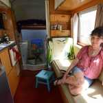 Deanna Wohlgemuth inside her 17-foot 1965 Airstream on Friday July 17, 2015 in Vancouver, Wash. Now dubbed the Tin Cantina, Wohlgemuth uses the Airstream as a traveling vintage bar.  (Natalie Behring/The Columbian via AP) MANDATORY CREDIT