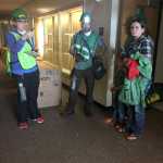Photo by Megan Pacer/Peninsula Clarion Community Emergency Response Team course members K.J. Hillgren (left), Jeremiah Millette (center) and volunteer victims strategize during a simulated earthquake exercise held Saturday Aug. 8, 2015 at Soldotna Prep School in Soldotna, Alaska.