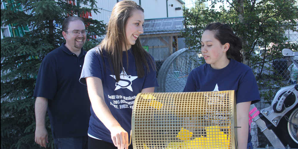 Youth winners of boat raffle