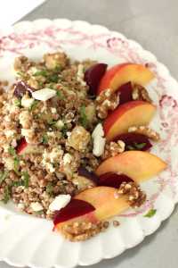 This July 13, 2015 photo shows kasha salad with beets, stone fruit, walnuts and mint in Concord, N.H. Kasha, the toasted form of buckwheat, cooks up in about 10 minutes. (AP Photo/Matthew Mead)