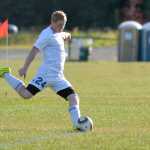 Photo by Rashah McChesney/Peninsula Clarion  Cook Inlet Academy's Brady Hammond kicks during a game against Delta Junction on Thursday August 20, 2015 in Kenai, Alaska.