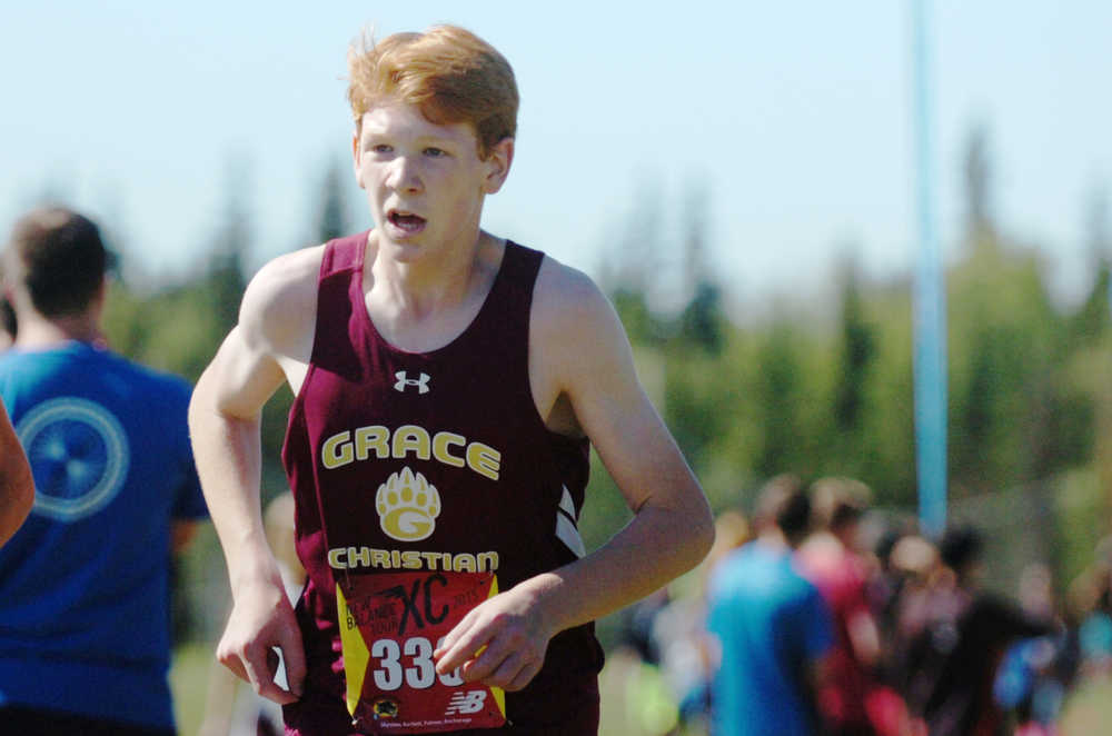 Ben Boettger/Peninsula Clarion Varsity runner Cameron Sheldon of Grace Christian High School runs the Tsalteshi Invitational Cross Country race at Skyview High School on Saturday, August 22.